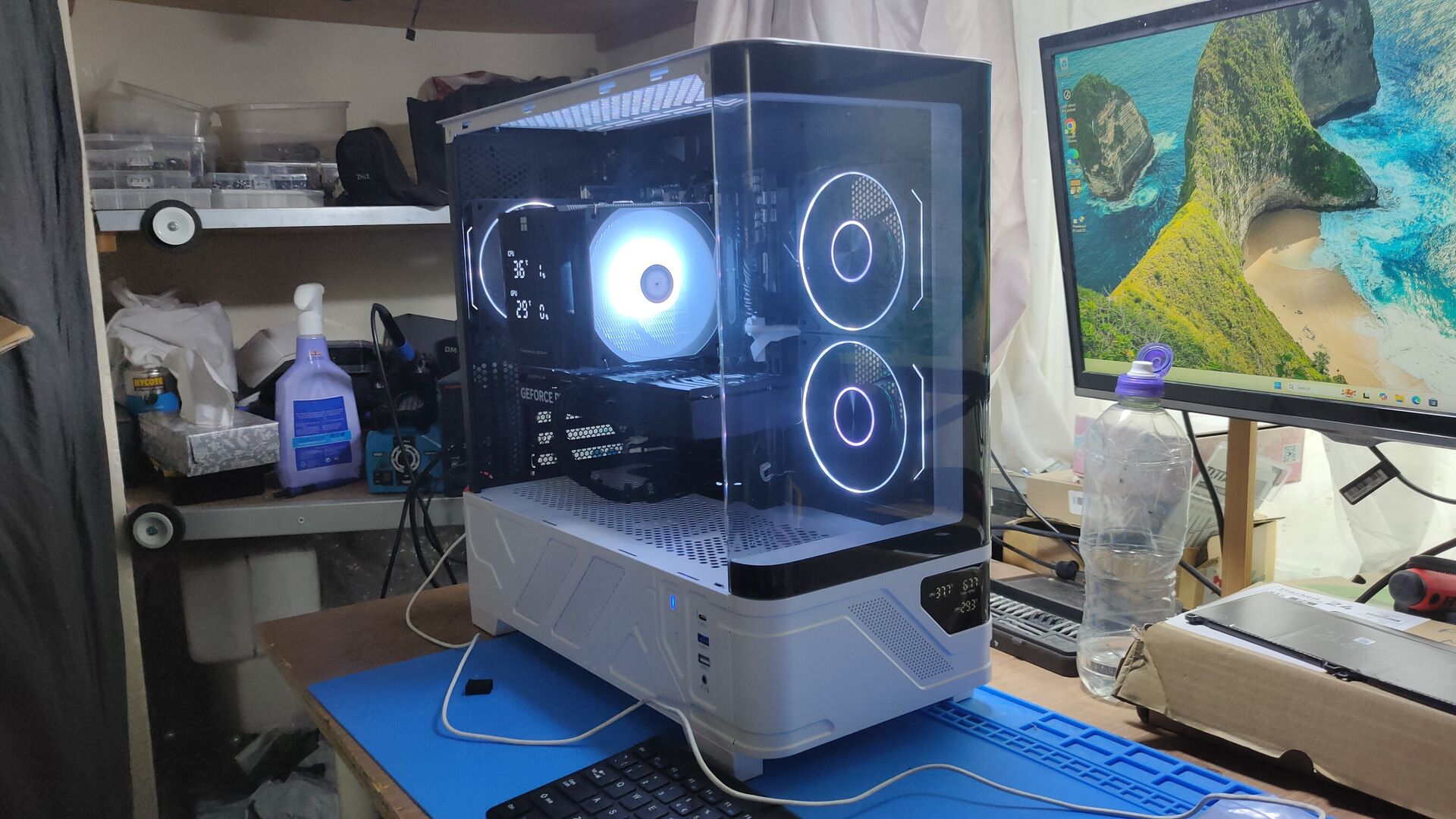 Original 17 February 2026 workshop photograph of AJ's completed white-and-black custom gaming PC