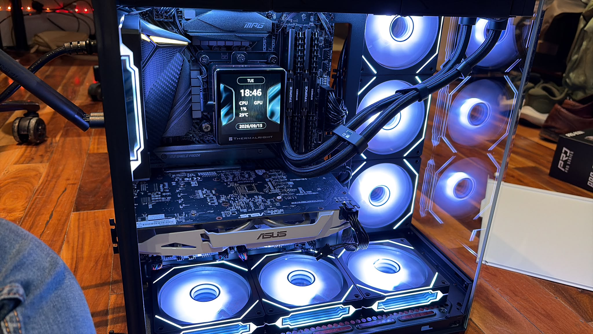 Theo's original blue-lit close-up with the case edges cropped